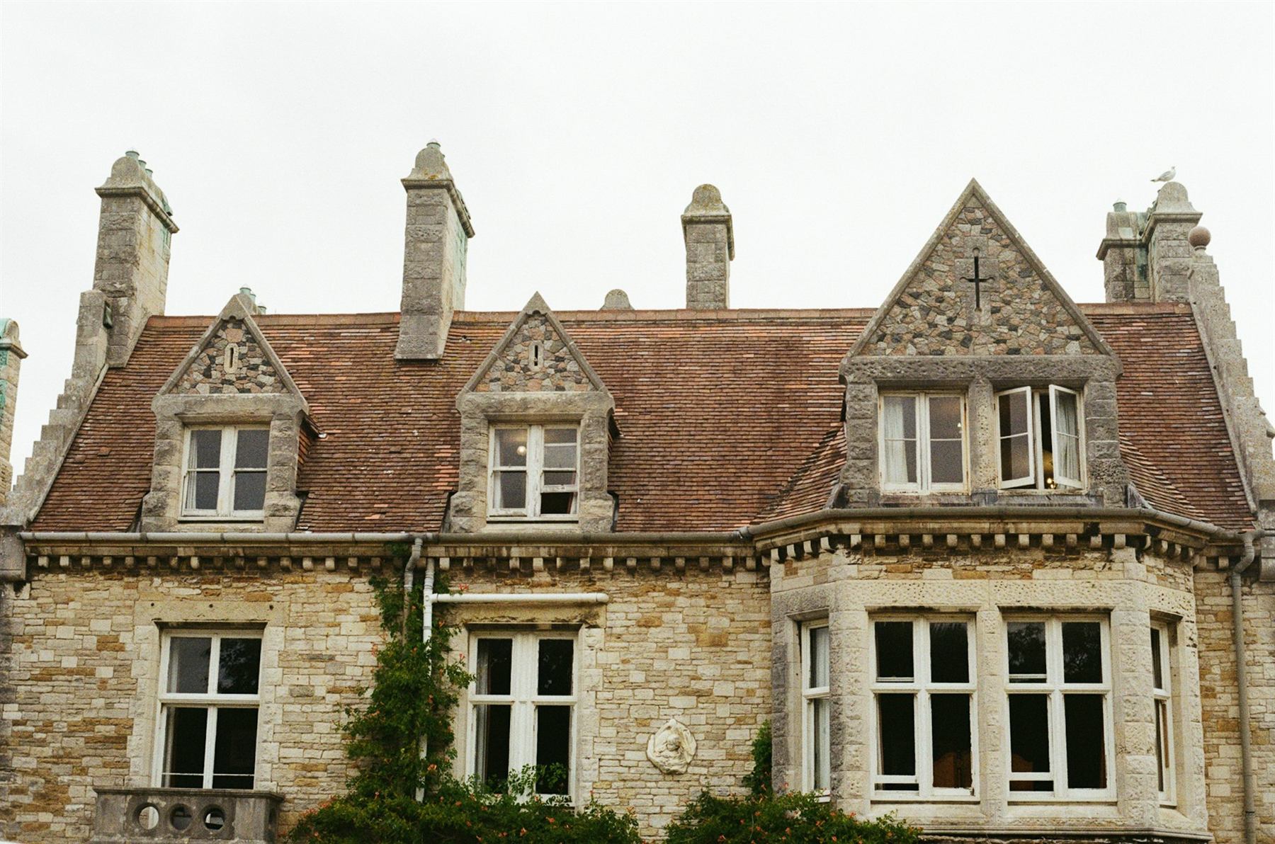 Classic stone estate with tall paned windows