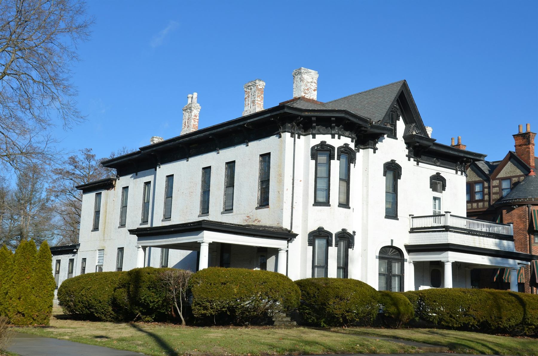 White Italianate estate with tall windows